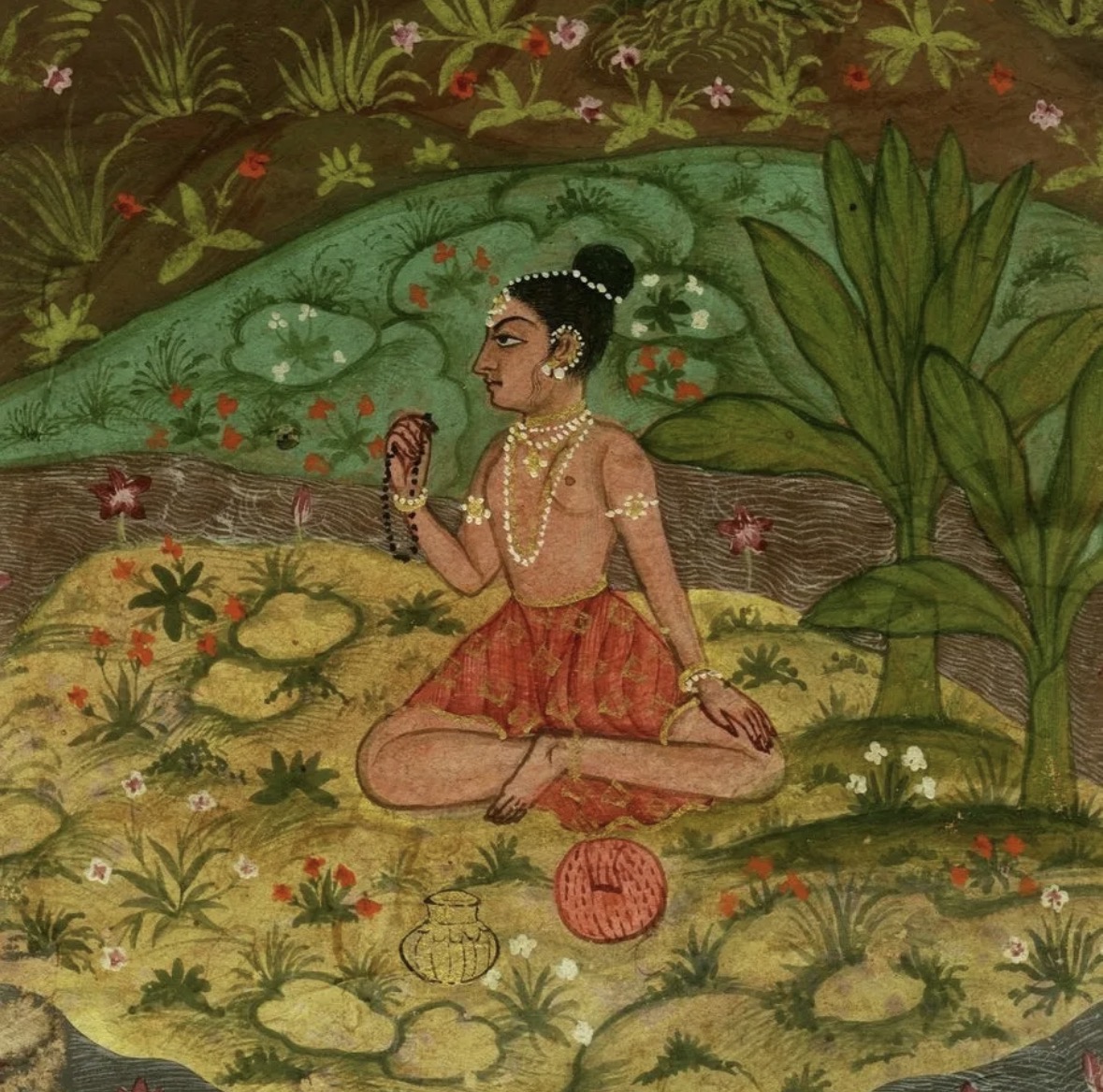 A traditional painting of a meditating practitioner beside a lotus pond